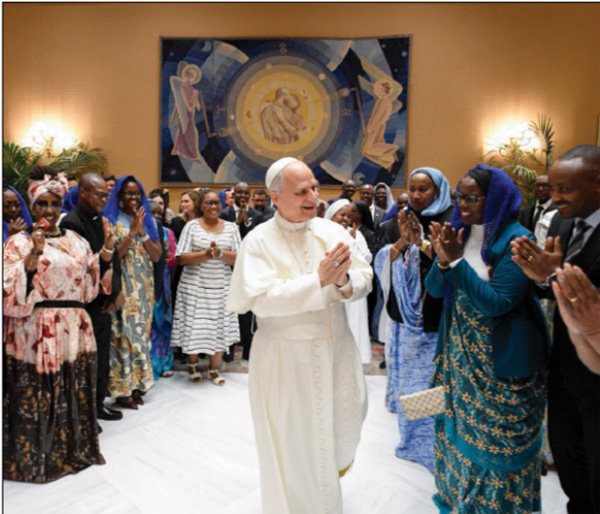 Leo XIV doing  namaste